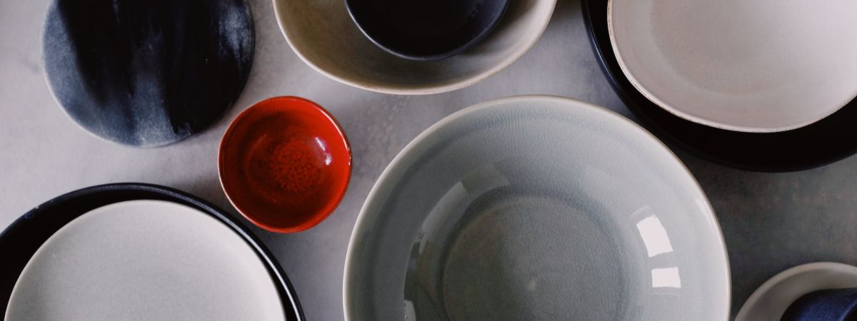 white ceramic bowl on white ceramic plate