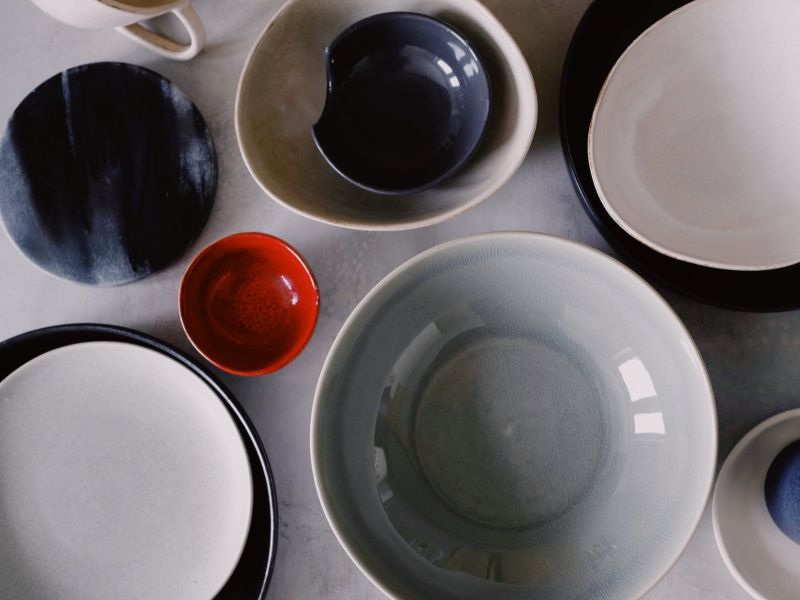 white ceramic bowl on white ceramic plate